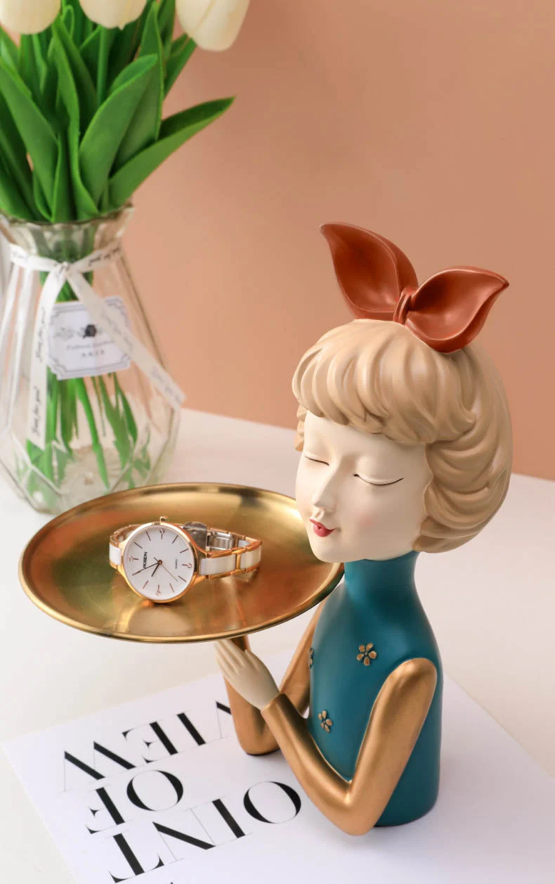 girl holding plate ornament jewelry display