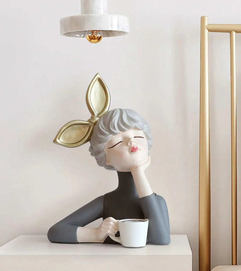 resin sculptures ornaments girl holding coffee