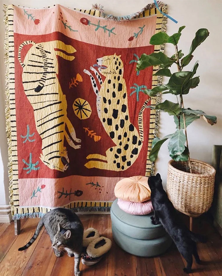 safari blanket featuring leopard and tiger graphics