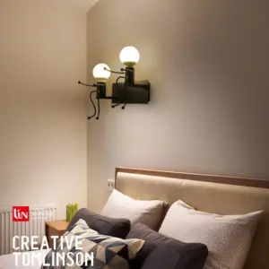 MetaalMeester - Robot wall lamp made of wrought iron