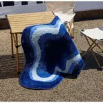 Abstract Shaped Soft Blue Tufted Carpet tag1
