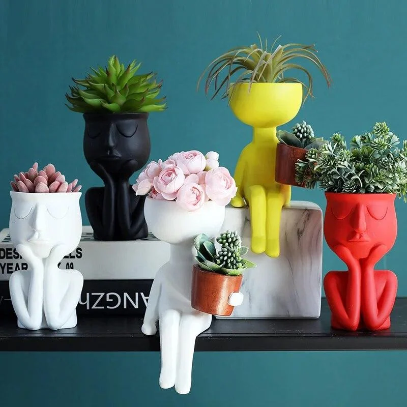 Artisan Portrait Pots: Handcrafted Planters for Unique Home Decor -