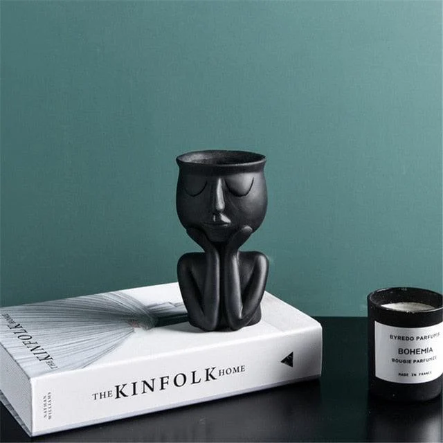 Artisan Portrait Pots: Handcrafted Planters for Unique Home Decor -