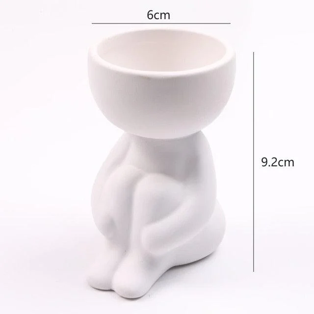 Artisan Portrait Pots: Handcrafted Planters for Unique Home Decor -