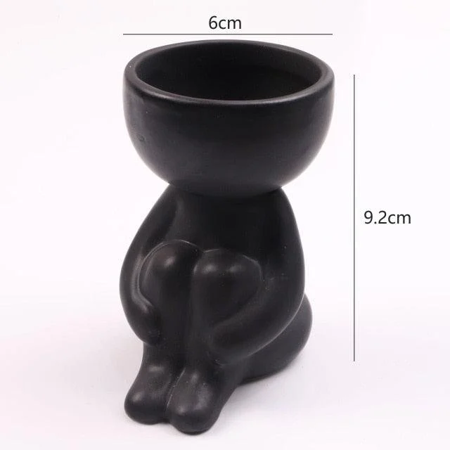 Artisan Portrait Pots: Handcrafted Planters for Unique Home Decor -
