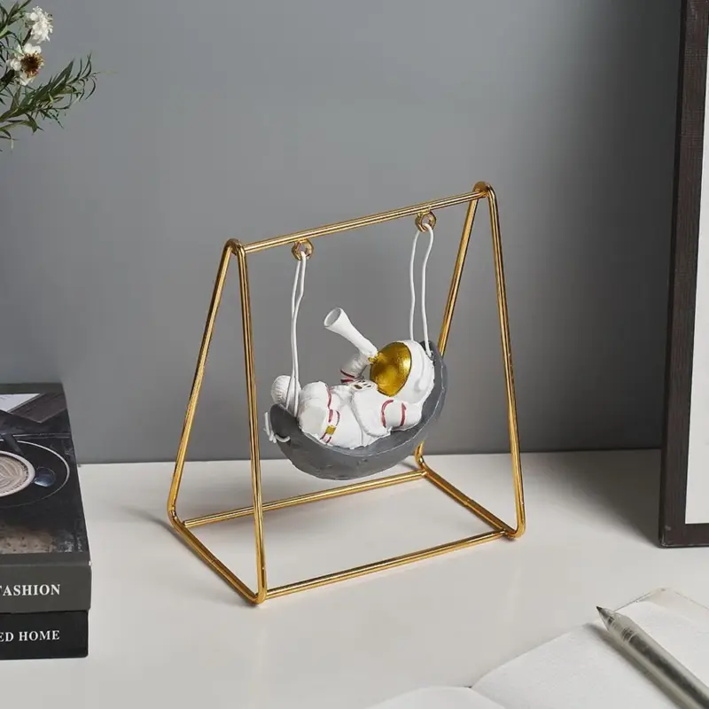 Astronaut Riding a Swing tag1