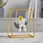 Astronaut Riding a Swing tag1