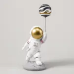 Astronaut with Planet Balloon tag1