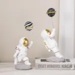 Astronaut with Planet Balloon tag1