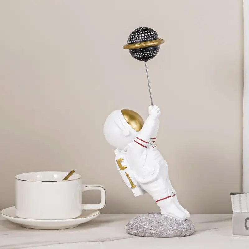 Astronaut with Planet Balloon tag1