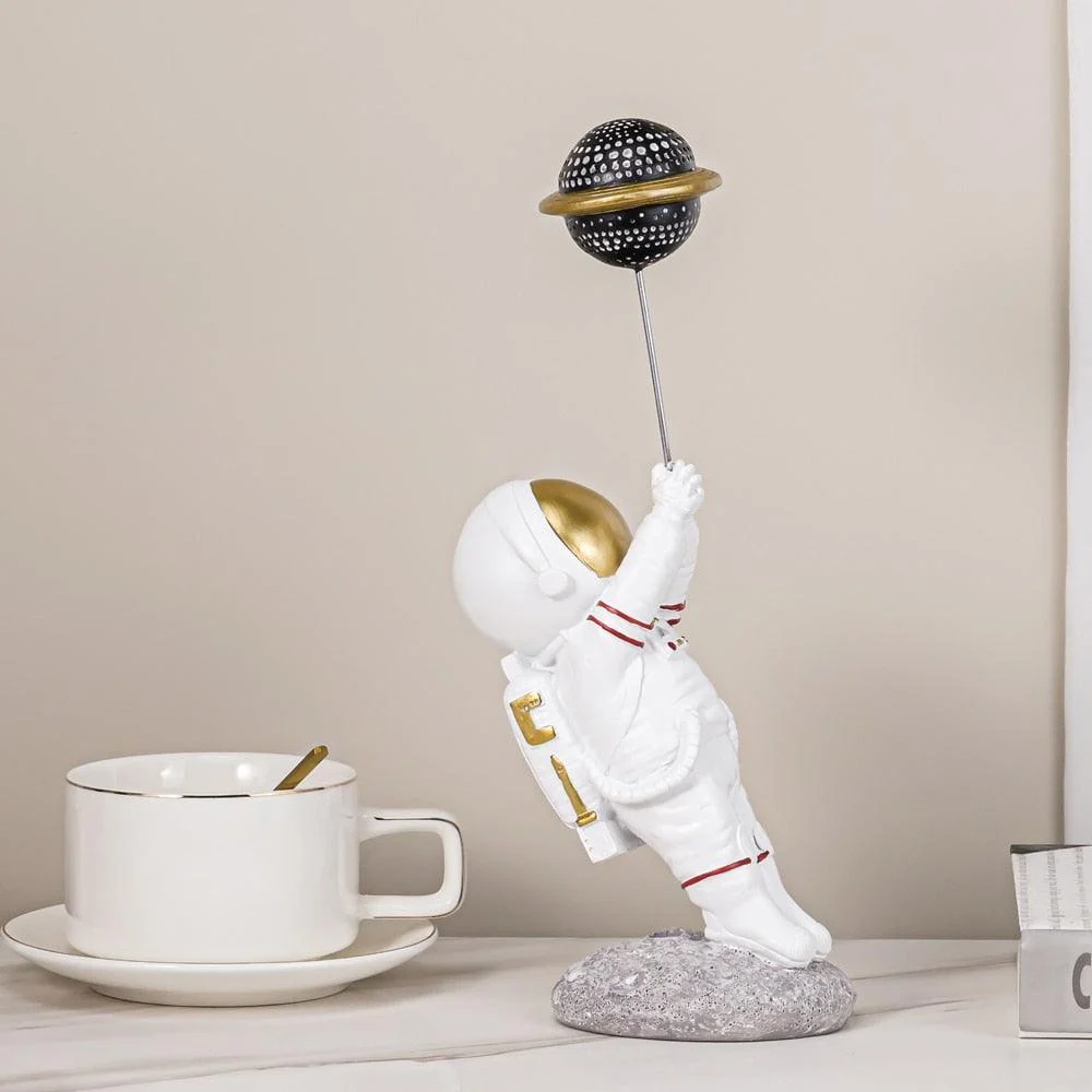 Astronaut with Planet Balloon -  - #tag1#