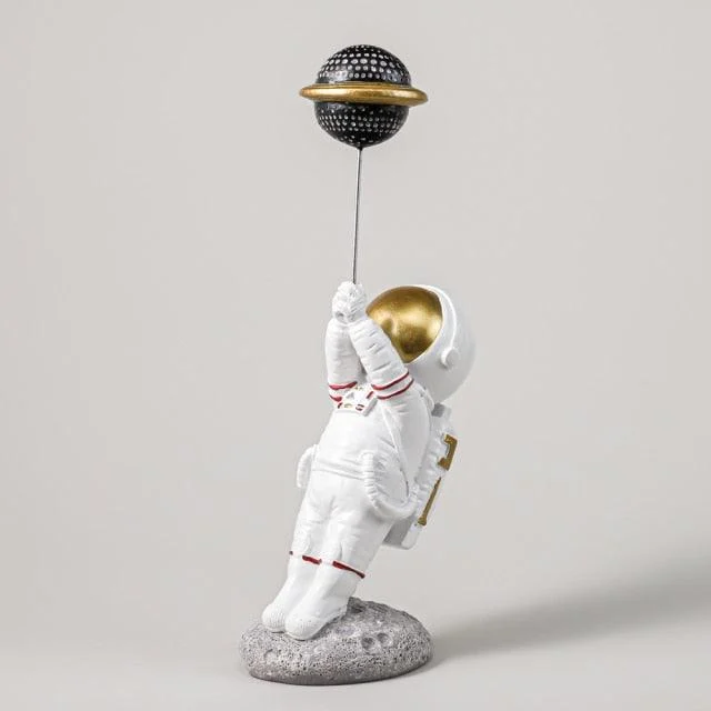 Astronaut with Planet Balloon -  - #tag1#