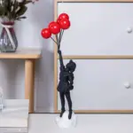Banksy_Flying_Balloon_Girl_Statue_-_-_tag1_-4145329 Banksy Flying Balloon Girl Statue tag1