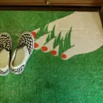 Bare Foot on Grass Corner Rug