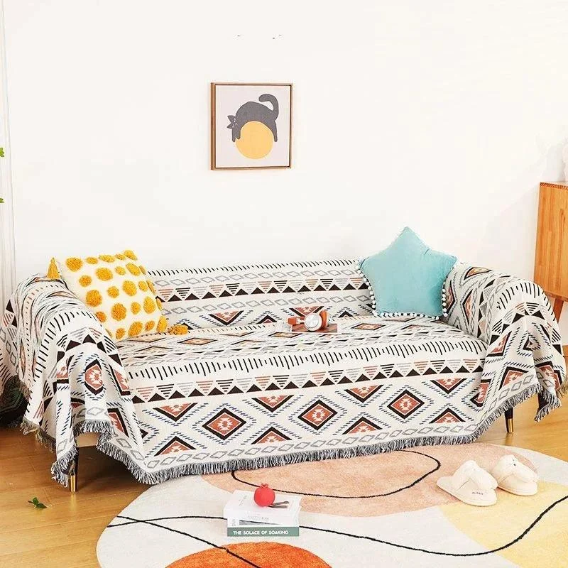 Boho Tassel Blanket: Chic Comfort for Sofa and Beyond. -
