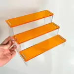Brightly Coloured Three Layer Display Stand tag1