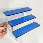 Brightly Coloured Three Layer Display Stand tag1
