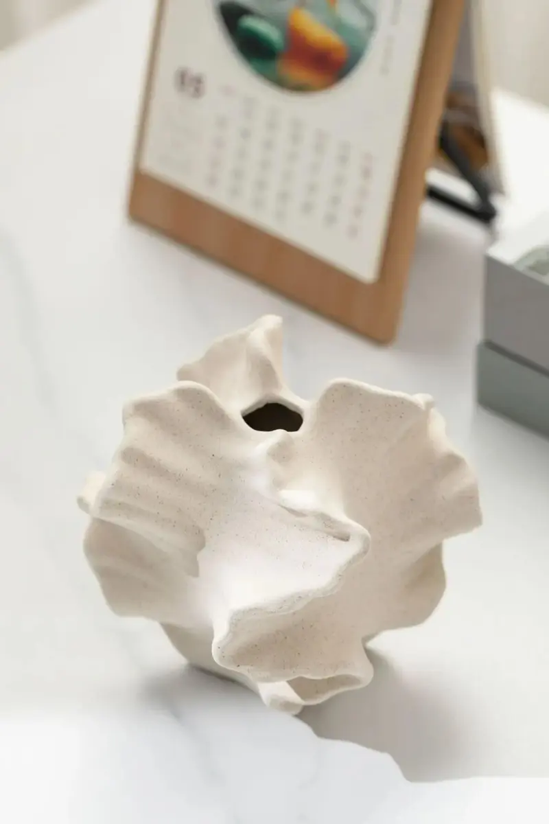 CreaseCraft Ceramic vase with folds