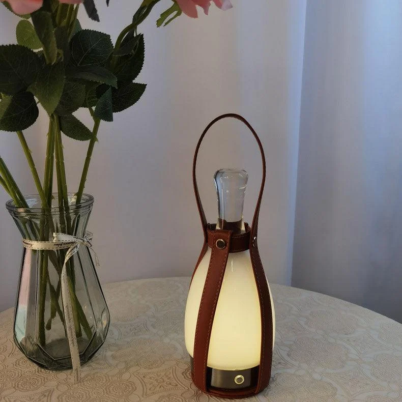 Creativeleatherglassbottleportablerechargeableledtablelamp 1 4cd9d74a 5b5c 4bb1 859a Ebf90389a73a