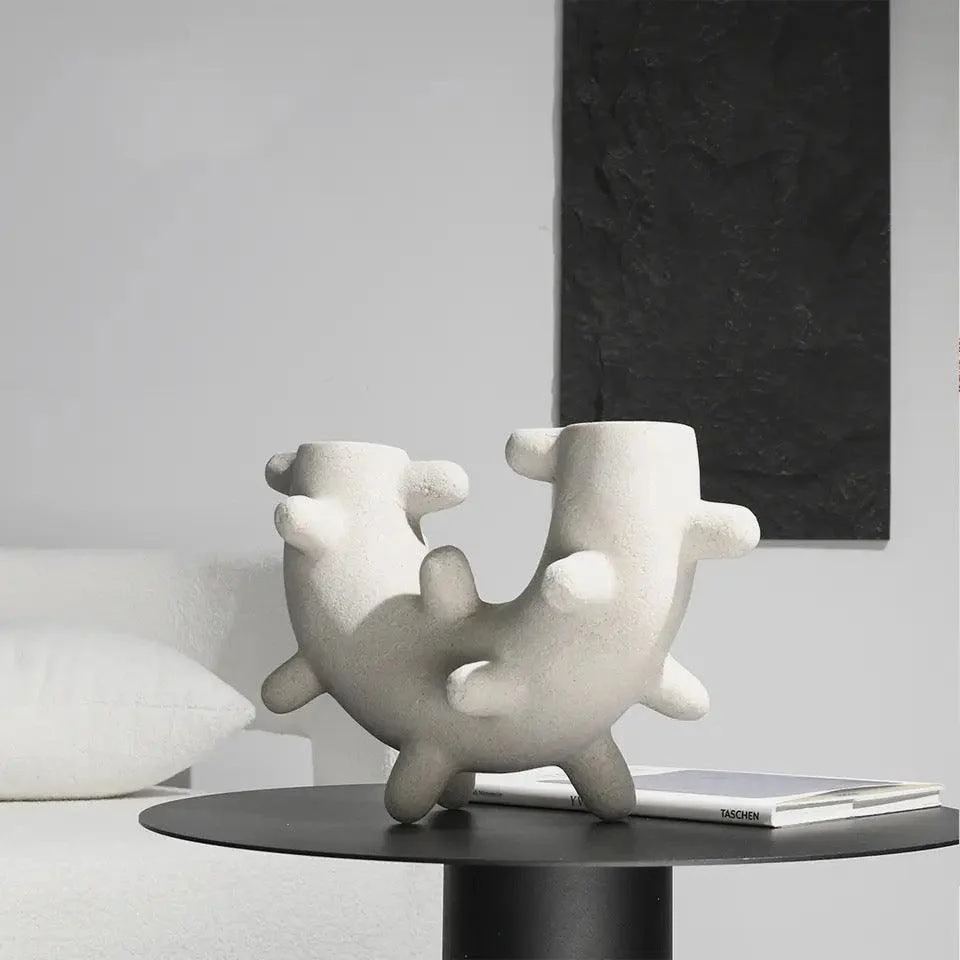 Curved Cylindrical Sculpture with Elongated Spheres -  - #tag1#