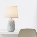 Eclat design table lamp with conical shade and cylindrical ceramic base tag1