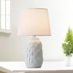 Eclat design table lamp with conical shade and cylindrical ceramic base tag1