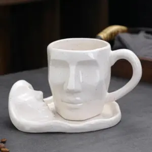 Faces Ceramic Coffee Cup & Saucer Set