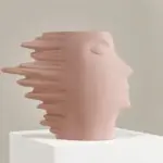 Faces in the Wind Vase