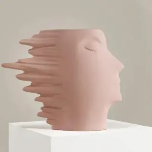 Faces in the Wind Vase