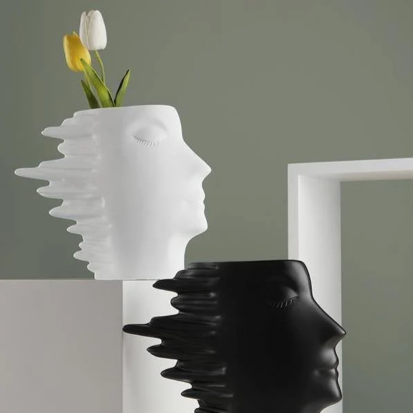 Faces in the Wind Vase -