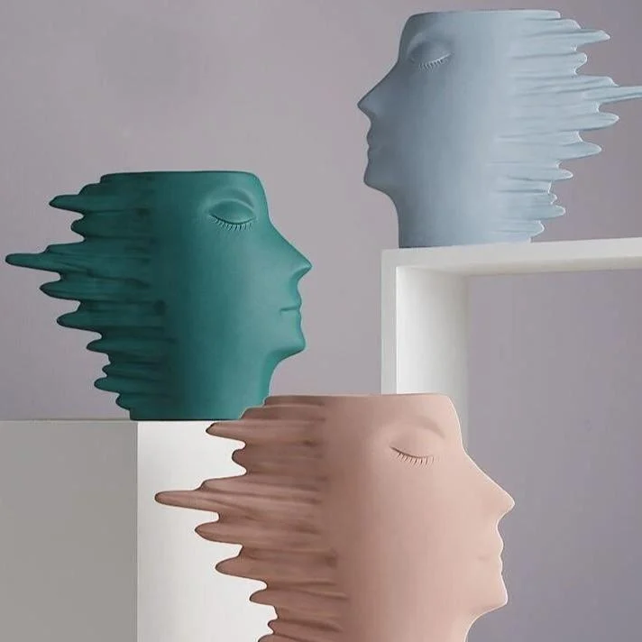 Faces in the Wind Vase -