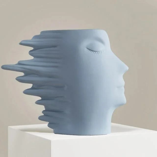 Faces in the Wind Vase -