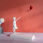 Flying Heart Balloon Girl Hand Crafted Sculpture