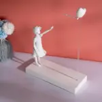 Flying Heart Balloon Girl Hand Crafted Sculpture