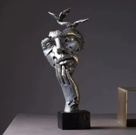 Handcrafted Face Sculptures -