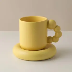 Handmade porcelain cup and plate