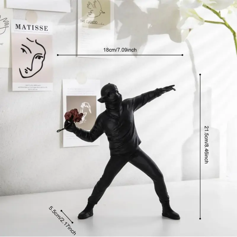 Homeko Man Throwing Flowers Sculpture