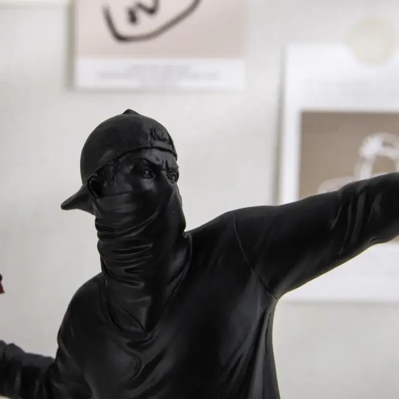 Homeko Man Throwing Flowers Sculpture