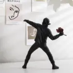 Homeko_Man_Throwing_Flowers_Sculpture_-_-4263105 Homeko Man Throwing Flowers Sculpture