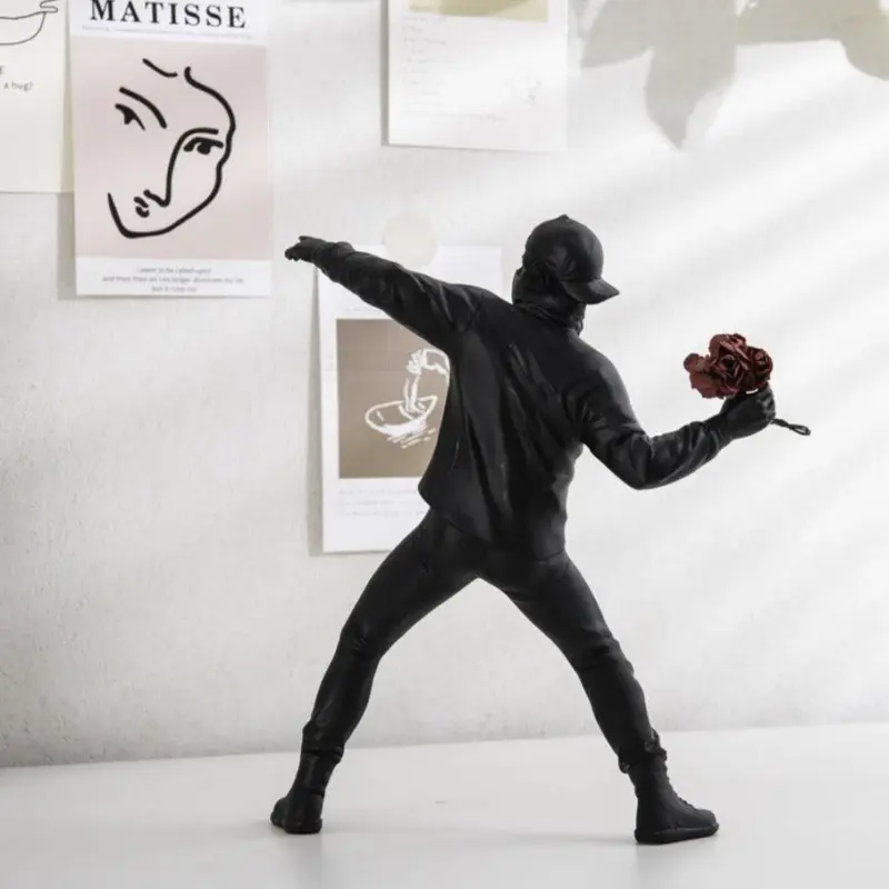 Homeko Man Throwing Flowers Sculpture