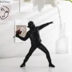 Homeko_Man_Throwing_Flowers_Sculpture_-_-4263110 Homeko Man Throwing Flowers Sculpture