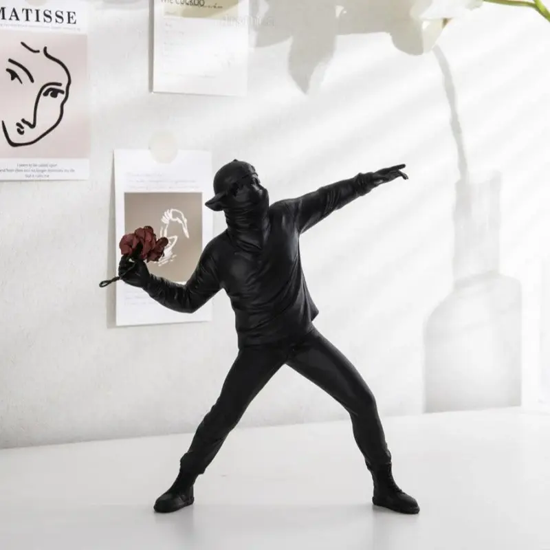 Homeko Man Throwing Flowers Sculpture