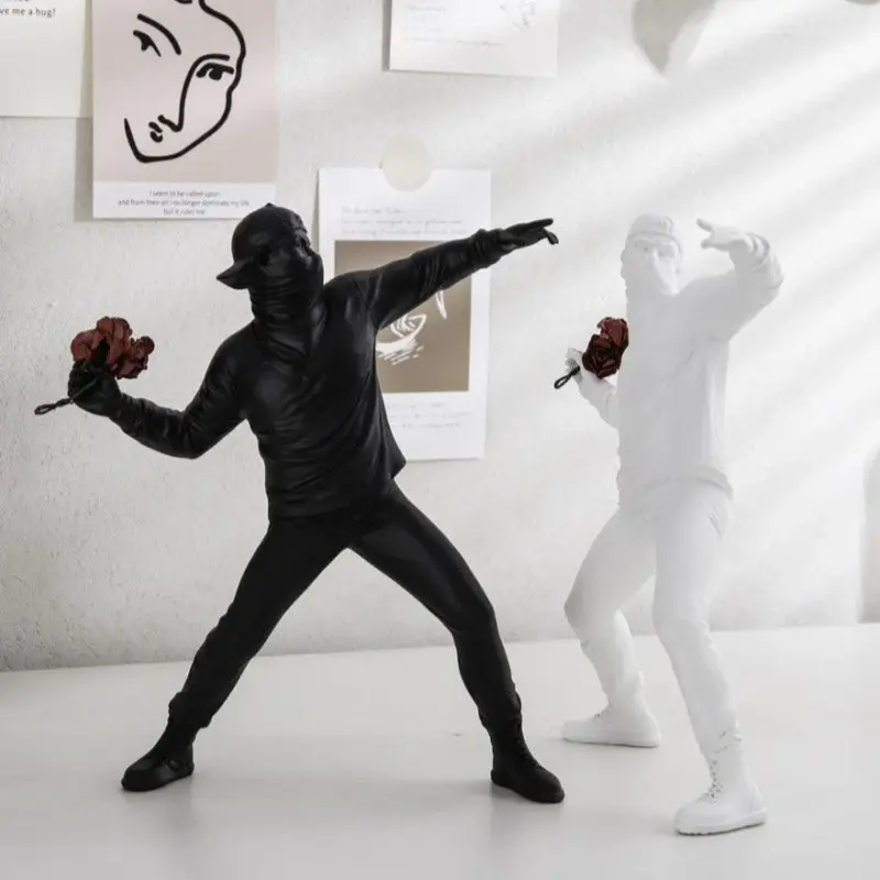 Homeko Man Throwing Flowers Sculpture