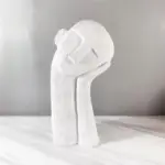 Homeko in Thought Statue