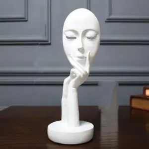 Homeko in Thought Statues
