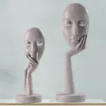 Homeko in Thought Statues