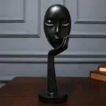 Homeko in Thought Statues