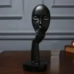 Homeko in Thought Statues