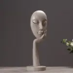 Homeko in Thought Statues