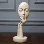 Homeko in Thought Statues
